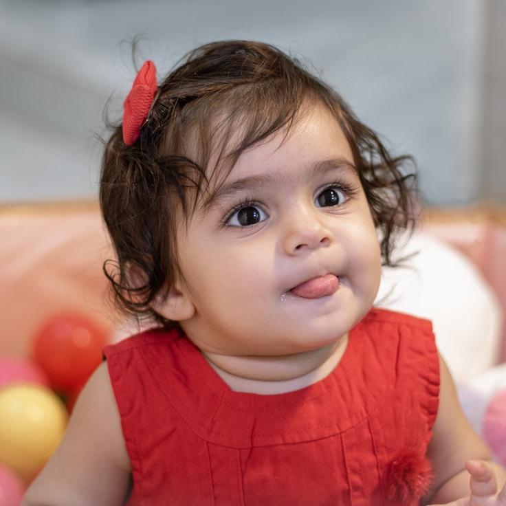 Avery Chen, Lead Design Curator at VectorStudioHub, reviewing corporate floral arrangements